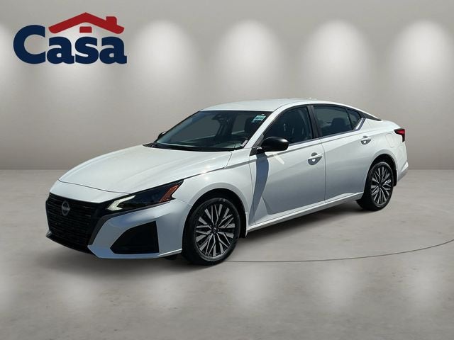 2026 Nissan Altima 2.5 SV in Pearl White Tricoat — front three-quarter view
