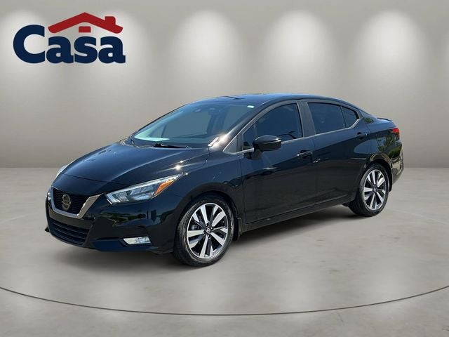 2020 Nissan Versa 1.6 SR in Super Black Metallic — front three-quarter view
