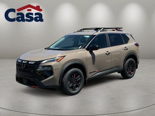 2026 Nissan Rogue Rock Creek in Baja Storm Metallic — front three-quarter view